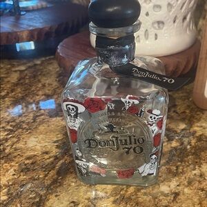 70 Tequila Bottle with Red and Black Design